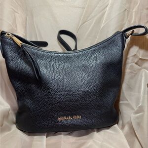 Micheal Kors crossbody/shoulder bag.